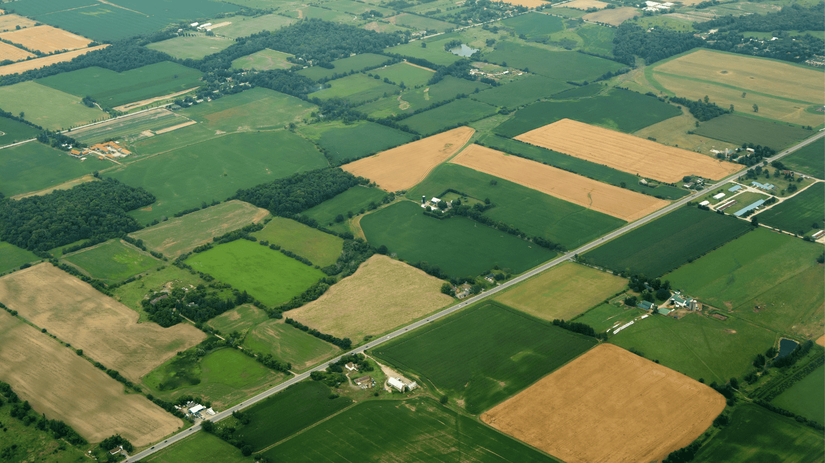 open-farm-land-with-some-houses